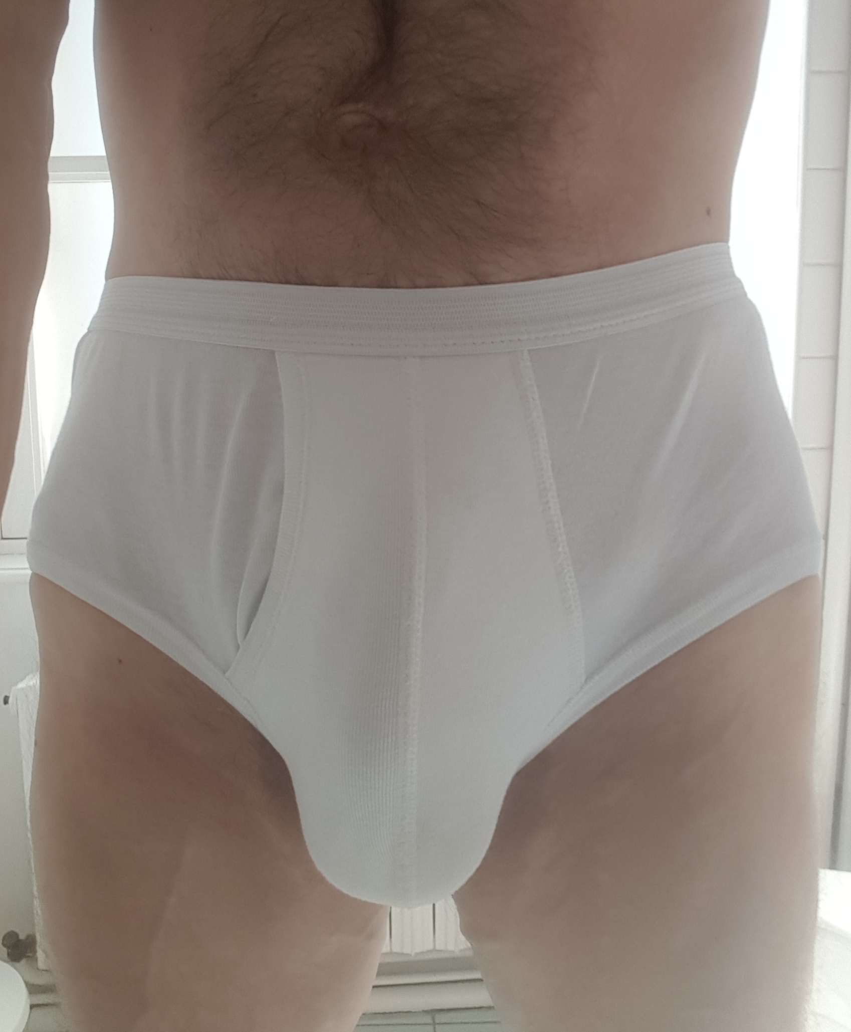 Le slip kangourou à poche blanc taille haute